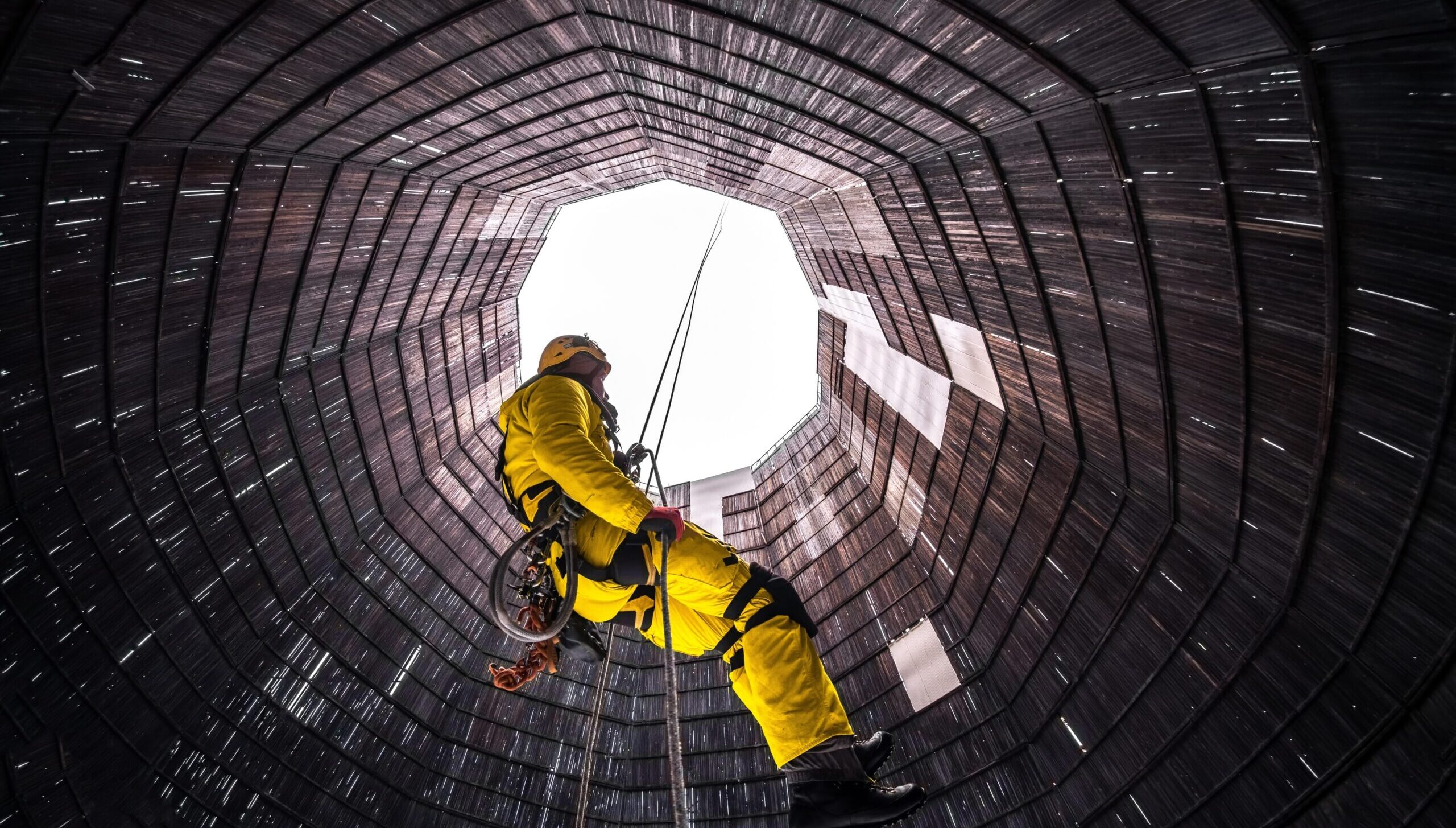 Man descending on rope